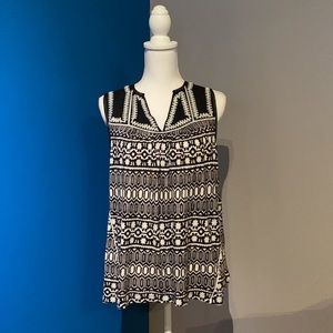 - Anthropologie buy. Black & white longer length top